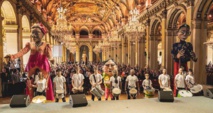 Giant Mozambique puppets, together with the band from Parade, at an earlier presentation in March 2019, all participants will march from Hôtel de Ville to the theatre on Friday next ©Thomas Amouroux, Théâtre du Châtelet