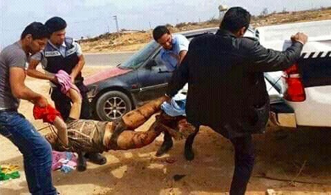 Libyen emmené de force en prison (c) DR. Cliquer sur la photo pour accéder à d'autres photos.